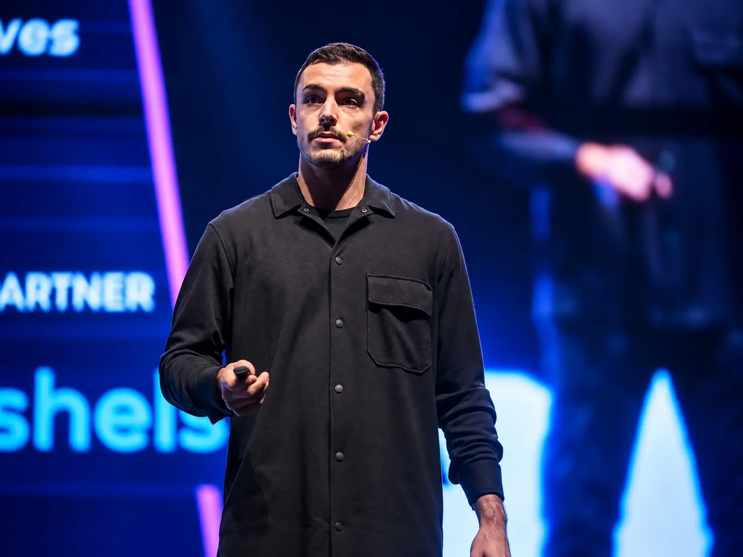 Viktor Sushelski speaking on stage